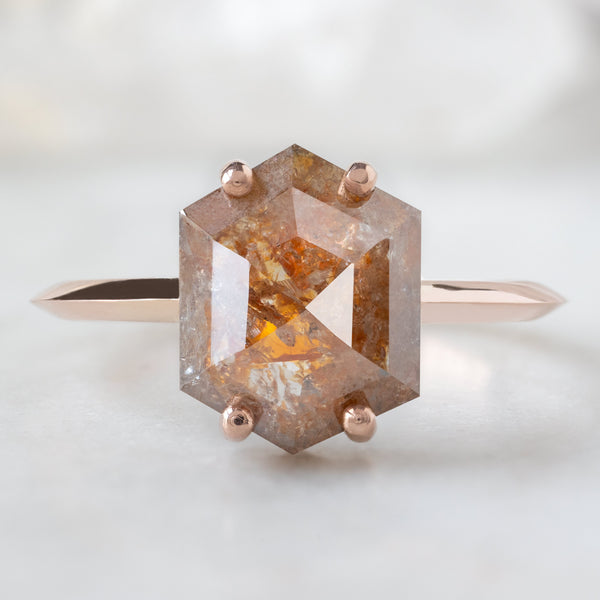 The Bryn Ring with a 2.03ct Hexagon Red Diamond in 14K Rose Gold on White Marble